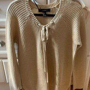 beige criss cross sweater
